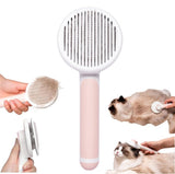 Mutt Studio Self Cleaning Cat Brush in pink, designed for effective pet grooming and shedding.
