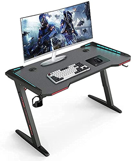Eesyy Gaming Desk with RGB lighting, black carbon fiber surface, cup holder, and headphone hook