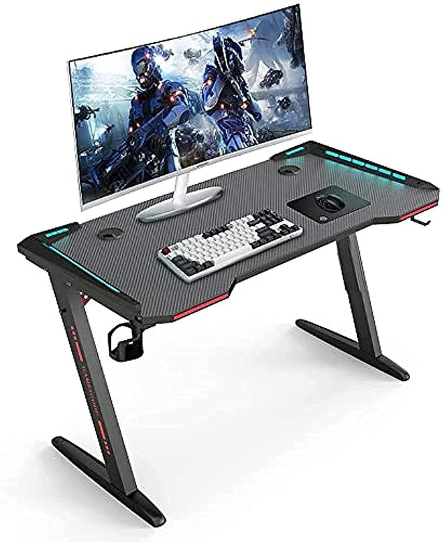 Eesyy Gaming Desk with RGB lighting, black carbon fiber surface, cup holder, and headphone hook